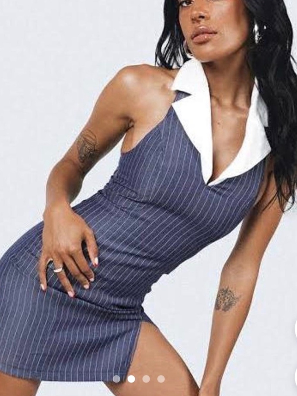 Navy pinstripe mini dress from Princess Polly.